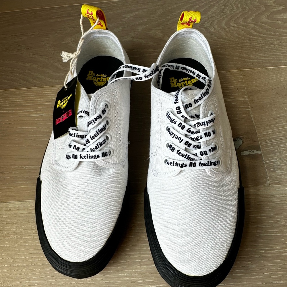 Dr. Martens White Canvas Sneakers with Black Soles